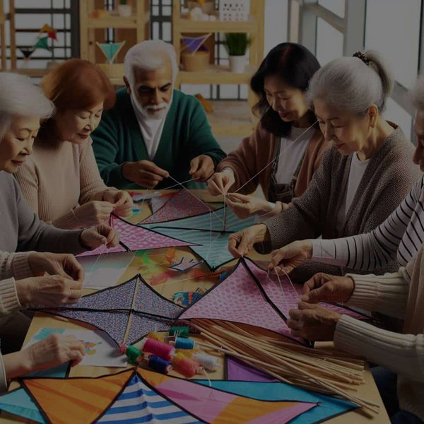 Quel est le rôle des ateliers de fabrication de cerfs-volants dans le développement de la motricité chez les seniors ?